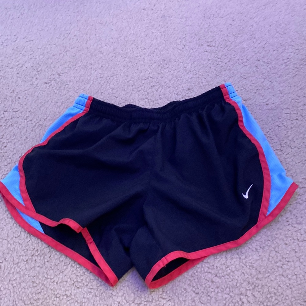 Pink blue and black Nike shorts
